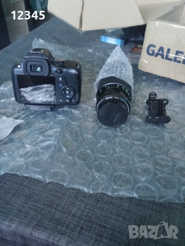 Продавам професионален фотоапарат PENTAX K50 + подарък стойка, снимка 4 - Фотоапарати - 54333474