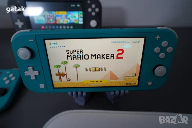 Nintendo Switch Lite с поставен чип, 128GB и 18 игри, снимка 4 - Nintendo конзоли - 55354596