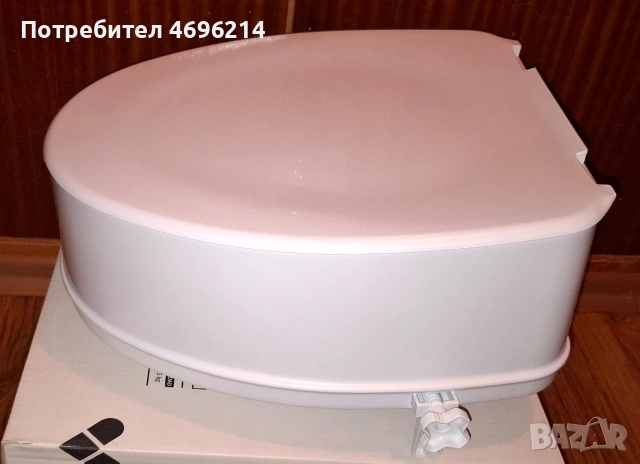 Повдигната тоалетна седалка 