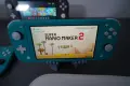 Nintendo Switch Lite с поставен чип, 128GB и 18 игри, снимка 4
