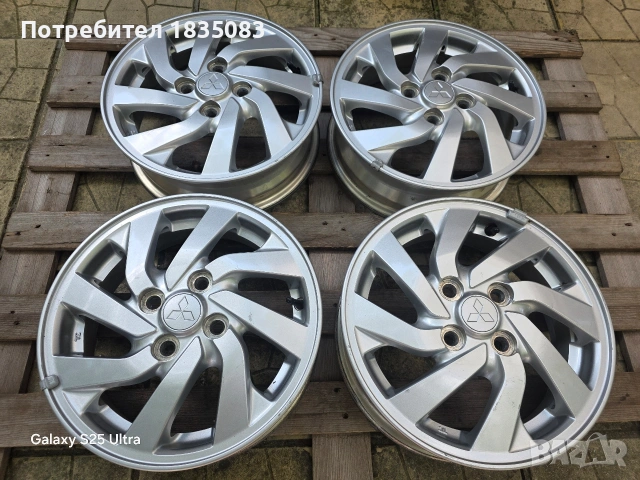 Лети джанти 14ки 4х100 Mitsubishi, снимка 2 - Гуми и джанти - 55178909