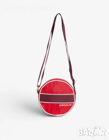 ADIDAS Round Bag Red Adidas Round Bag комбинира ретро стил от 70-те години с модерен дизайн 
