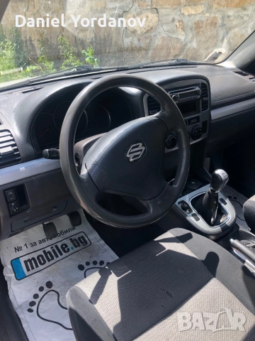 Suzuki Grand Vitara, снимка 10 - Автомобили и джипове - 54573180