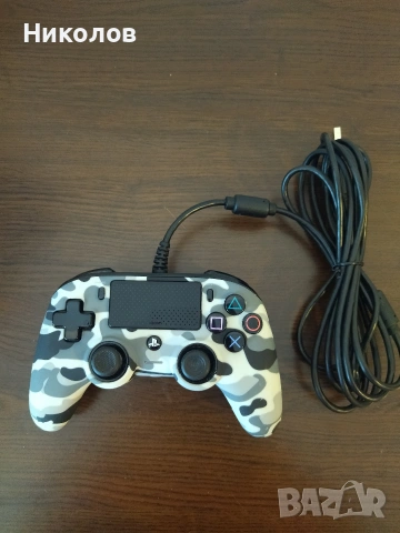 Продавам джойстик Nacon PlayStation 4/PC USB SLEH-00629 камуфлаж