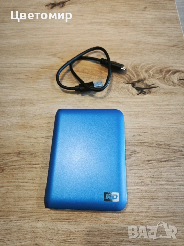 Външен хард диск WD My Passport 750GB 2.5" USB 3.0 100% Health ( работил е 6дни)