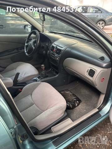 Nissan Almera, снимка 6 - Автомобили и джипове - 54754504