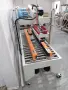 Продава се нова индустриална кашонираща машина за оформяне и автоматично затваряне на кашони., снимка 6