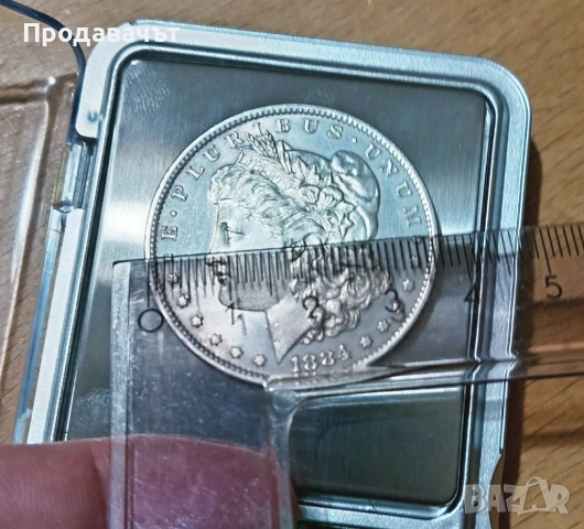 Сребърен американски Морган долар от 1884 г., снимка 6 - Нумизматика и бонистика - 54008401