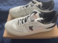 Продавам Cruyff Endorsed Tennis sneakers in a white colorway with orange and black accents, снимка 2