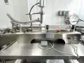 Продавам полуавтоматична пневматична бутална машина за пълнене на течни и гъсти продукти, снимка 1