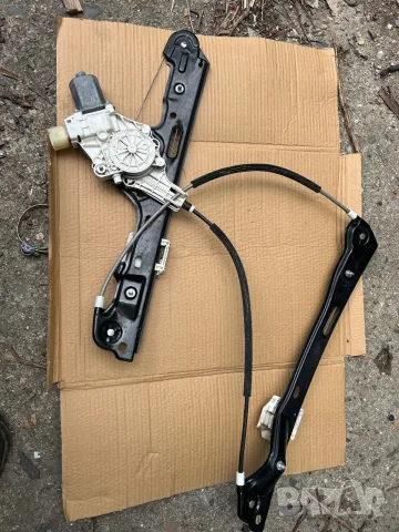 стъклоповдигач преден ляв за BMW E87 7067795 7138465E