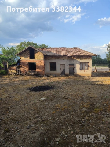 Имот с постройка 
