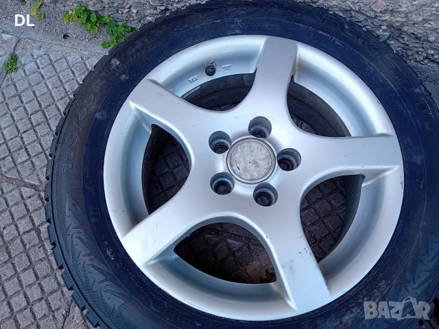 14 5х100 14 5x100 със зимни гуми с шипове 175 65 14, снимка 5 - Гуми и джанти - 50574714