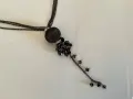 Колие с многопластова верижка, голяма мрежеста топка и каскада от фасетирани мъниста., снимка 3