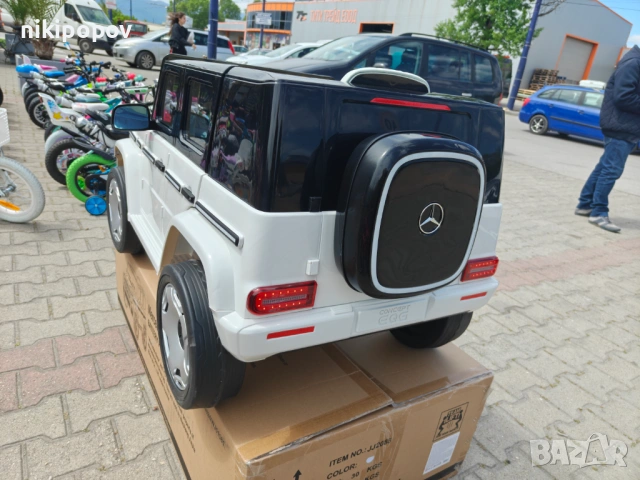 MERCEDES Акумулаторен джип EQG бял, снимка 9 - Детски велосипеди, триколки и коли - 54645996