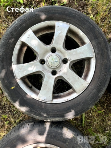  Продавам алуминиеви джанти Mitsubishi 15 цола 4x114.3, снимка 3 - Гуми и джанти - 54675240