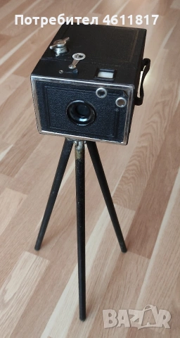 Фотоапарат с тринога