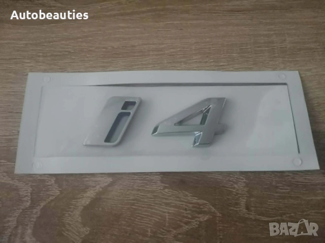 сребриста емблема BMW i4