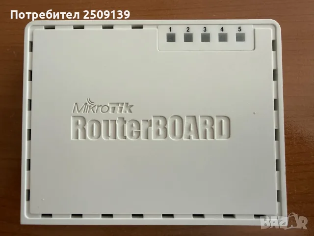MikroTik RB750GL, снимка 2 - Рутери - 55583266