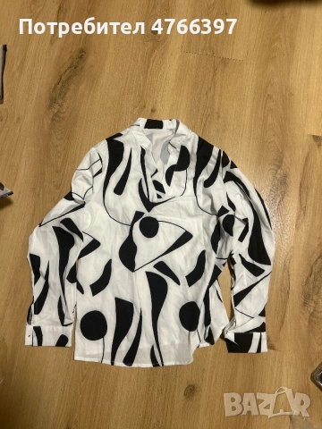 Елегантна пролетна блуза с черни мотиви