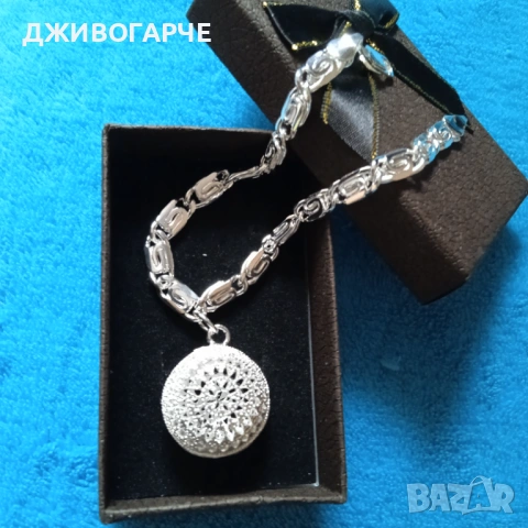 Нова, сребърна гривна с масивна висулка филигран.В кутия.