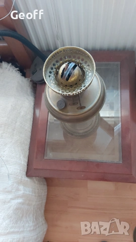 Three bronze oil/kerosene lamps,  without shades or chimneys. 