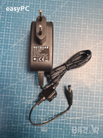 Оригинален захранващ адаптер NETGEAR 332-10538-01 AD810000 007-3LF 12V 1A
