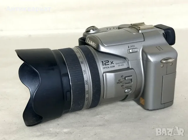 Лот два фотоапарата Panasonic DMC-FZ200 + Panasonic DMC-FZ50, снимка 12 - Фотоапарати - 55474641