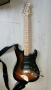 Продавам китара Stratocaster Squier + усилвател Fender, distortion педал и аксесоари, снимка 1