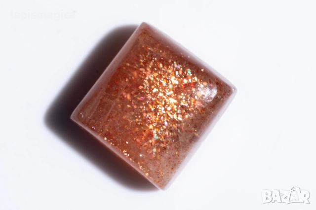 Слънчев камък тип конфети 20.39ct 16mm октагон кабошон