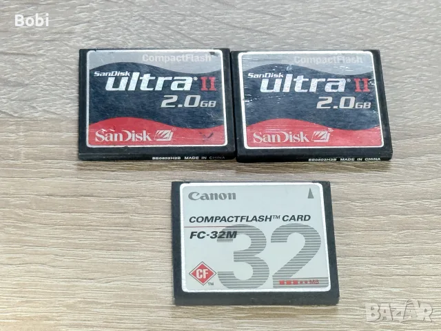 3 броя CompactFlash (CF) карти – 2× SanDisk Ultra II 2GB + Canon FC-32M 