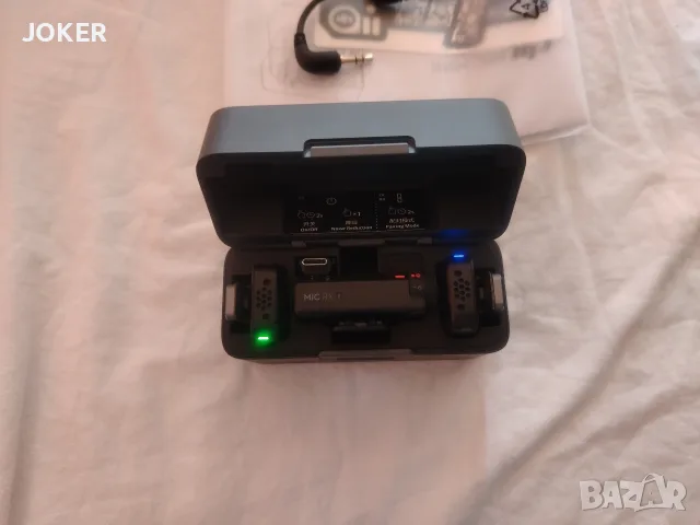 DJI Mic Mini – 2 предавателя + приемник + заряден кейс, пълен комплект, снимка 2 - Микрофони - 55601322