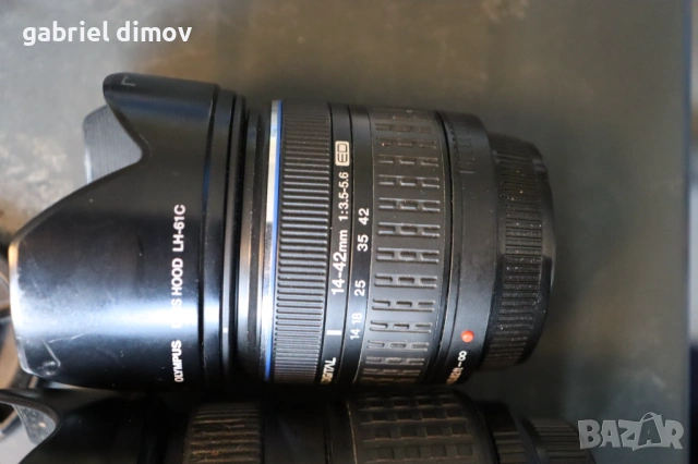 Фотоапарат DSLR Olympus e-520, снимка 7 - Фотоапарати - 54279400