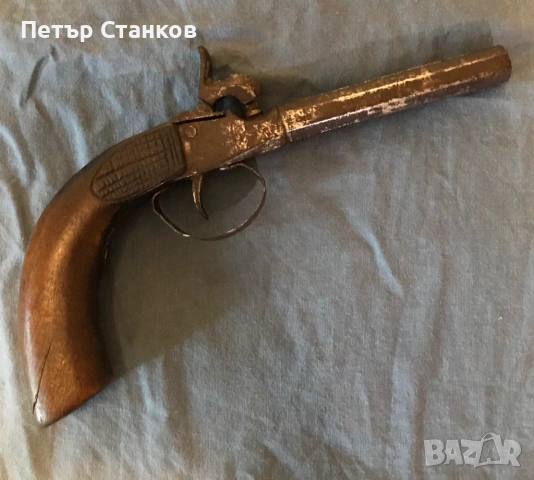 Капсулен пистолет, пищов