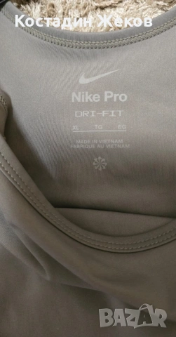  Нов.Дамски оригинален спортен кроп топ Nike Pro Dri-FIT Graphic Crop Tank . , снимка 7 - Корсети, бюстиета, топове - 54577487