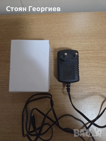 захранващ адаптер (зарядно устройство) с изходно напрежение 12V и ток 1000mA (1A)., снимка 2 - Друга електроника - 54444733
