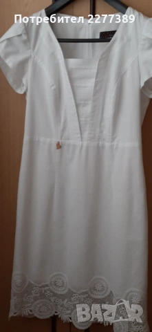 Бяла бутикова рокля