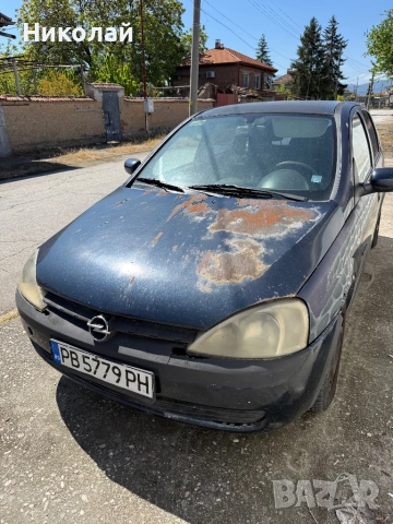 Opel Corsa C 1.2 - 2002 - бензин/газ, снимка 12 - Автомобили и джипове - 54406613
