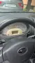Subaru Justy 2009 1.00 Бензин, снимка 7