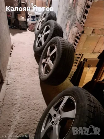 Продавам гуми /зимни/ с джанти 235/65/17, снимка 2 - Гуми и джанти - 55449585