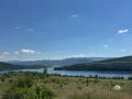 Парцел 9030 кв.м до главен новоасфалтиран път с панорамна гледка към язовир Пчелина, с. Ковачевци, снимка 5