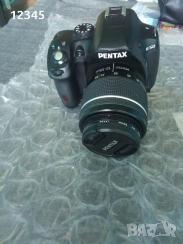 Продавам професионален фотоапарат PENTAX K 50