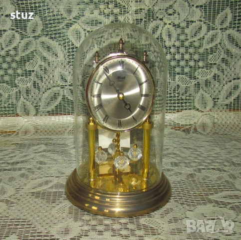 Настолен часовник Hermle с въртящи се кристални сфери