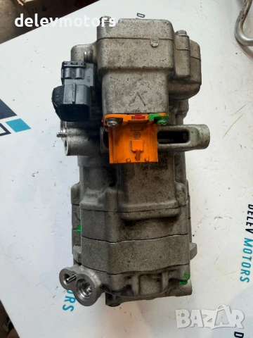 977E1-AT100 компресор за климатик от Hyundai Kona SX2 1.6 GDI Hybrid, двигател G4LL, 141 кс., автома
