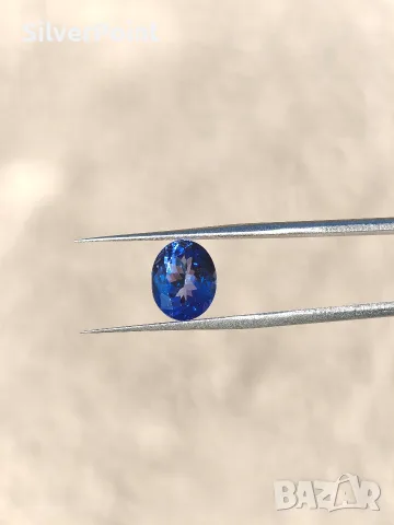 Танзанит чист на лупа 3.12ct с швейцарски сертификат 
