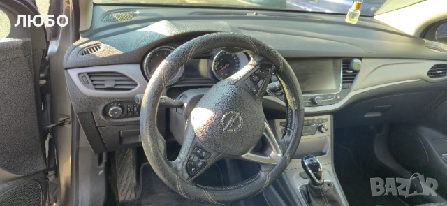 Opel Astra Sports Tourer, снимка 7 - Автомобили и джипове - 52752194