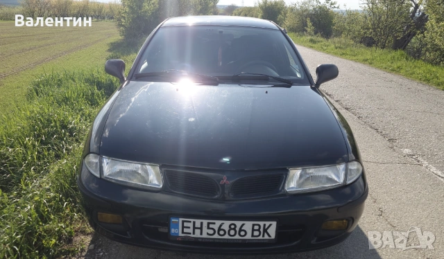 Продавам автомобил Mitsubishi Carisma  , снимка 4 - Автомобили и джипове - 54287441