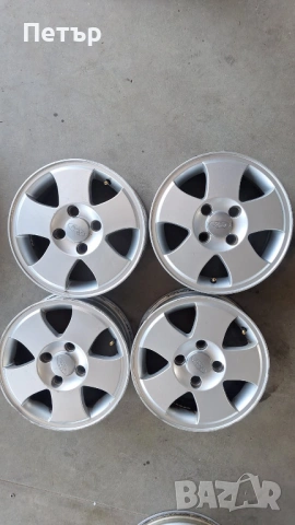 ОРИГИНАЛНИ АЛУМИНИЕВИ ДЖАНТИ ЗА ФОРД  -4х108х63.4-14цола