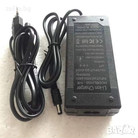Зарядно устройство 24V Li-Ion 29.4V 2A 58W – за електрически тротинетки и велосипеди 10411, снимка 4 - Части за велосипеди - 54692874