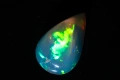 Прозрачен Естествен етиопски опал 2.90ct капка кабошон, снимка 3